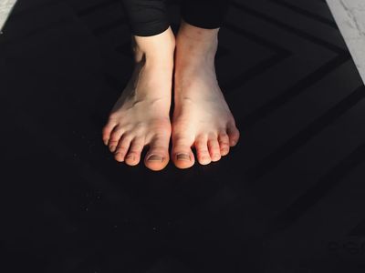 Close-up on feet position during a balance exercise.